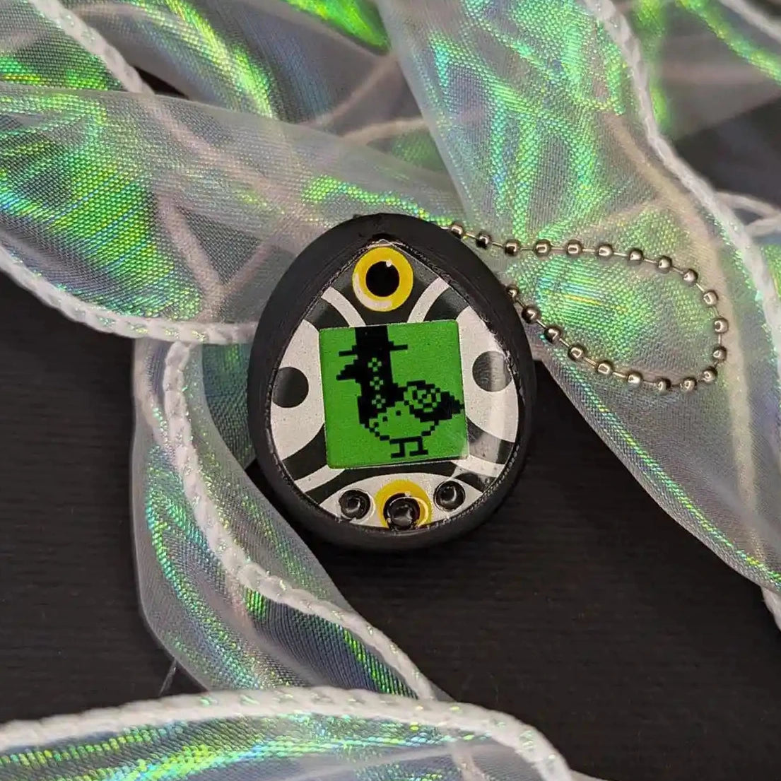 K-Pop Demon Hunters · Derpy & Sussie Tamagotchi Keychain