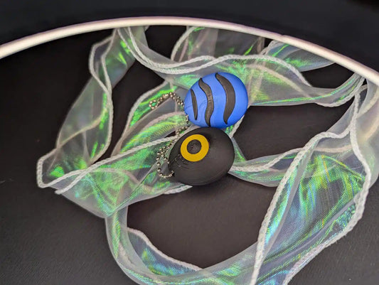 K-Pop Demon Hunters · Derpy & Sussie Tamagotchi Keychain